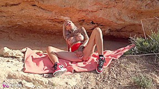 A nymphomaniac, fit German woman named Sophie Logan, covered in many tattoos, was picked up for sex.
