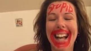 Slut gets stupid written on her forehead and likes it